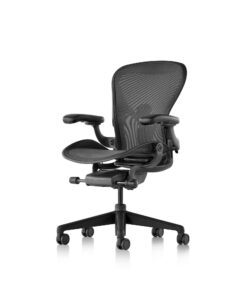 Herman Miller Aeron Remastered chair in graphite, three-quarter view of mesh back and armrests