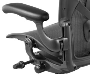 Close-up of Herman Miller Aeron Remastered adjustable armrest and Pellicle mesh seat detail